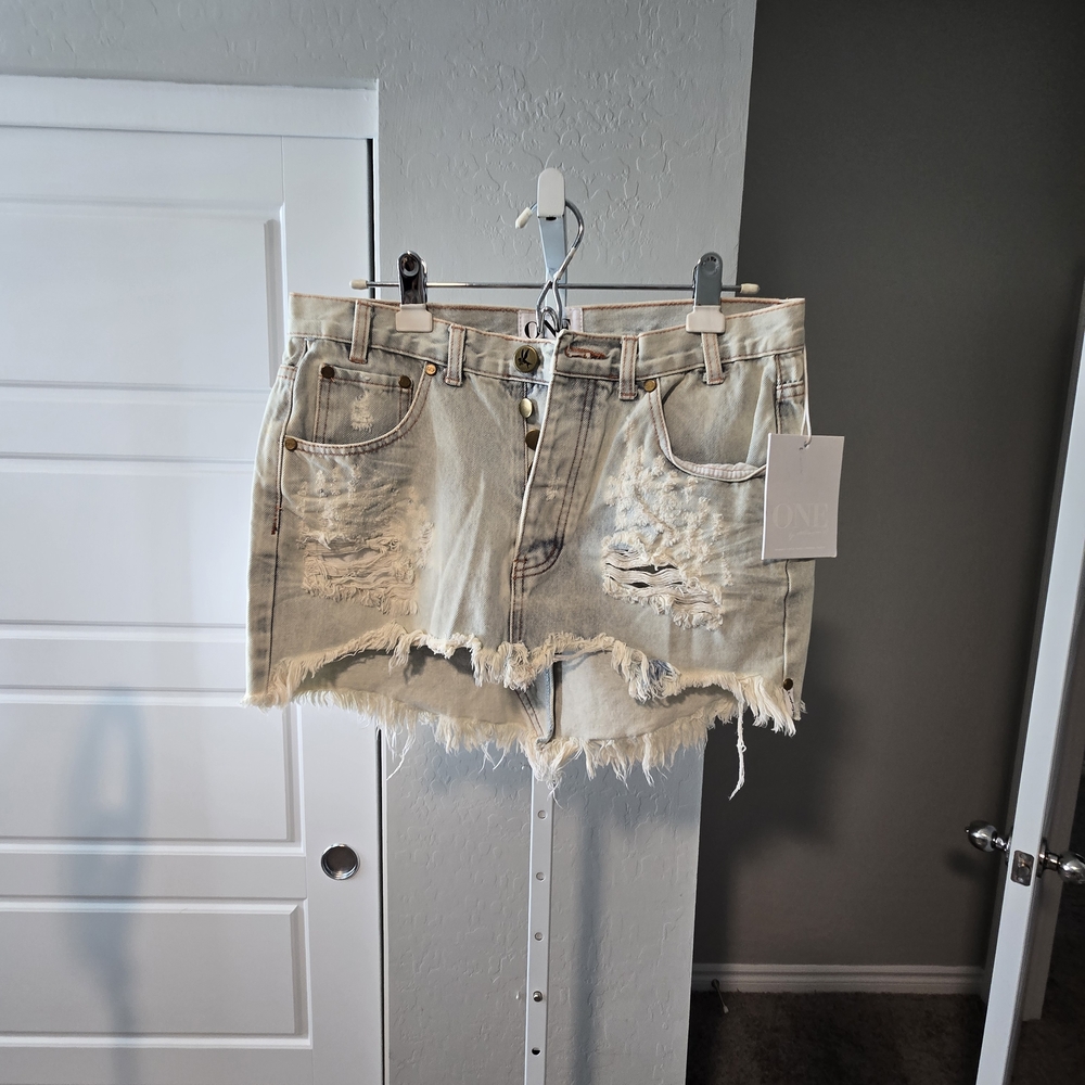 On Running Frayed Light Denim Jean Skirt